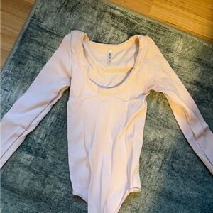 Aritzia Light Pink Long Sleeve Bodysuit